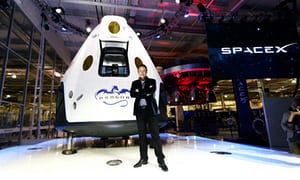 SpaceX’s CEO, Elon Musk, unveils the company’s Dragon V2 spacecraft, designed to carry astronauts into space on 29 May 2014. It has yet to carry humans into space.